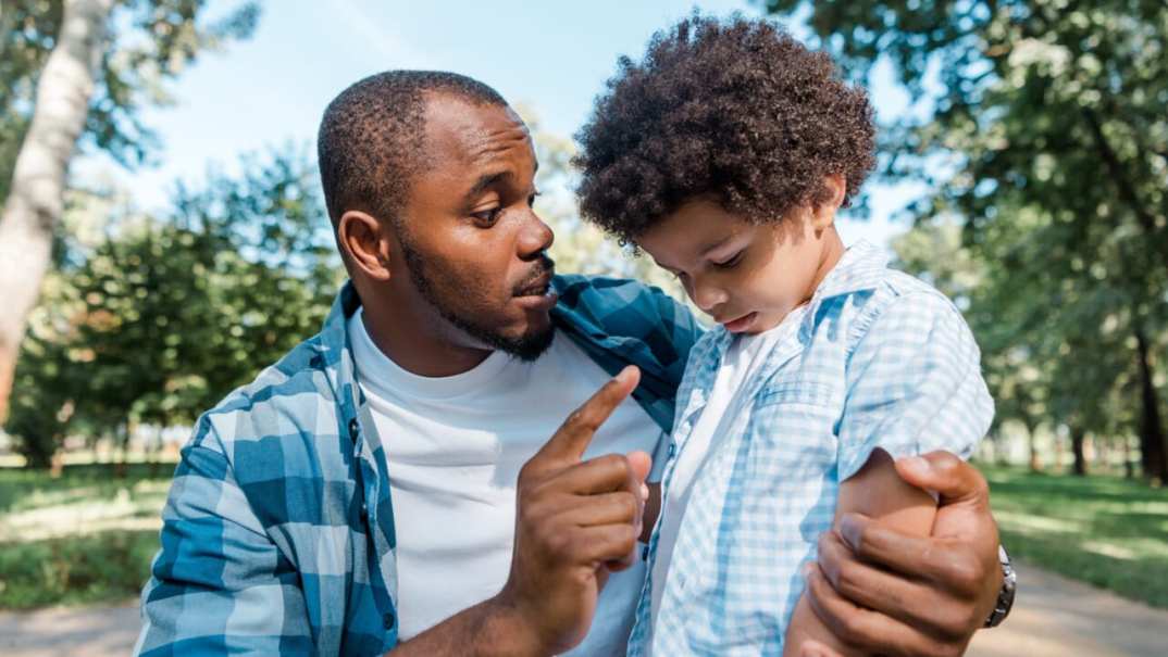 A father admonishes his child