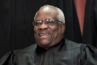 Justice Thomas joins arguments remotely after a hospital stay