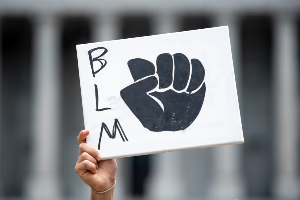 Black Lives Matter sign, theGrio.com
