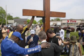 Shootings expose divisions on gun issue in faith communities
