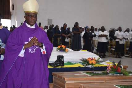 Nigeria funeral for church attack victims draws anger, tears