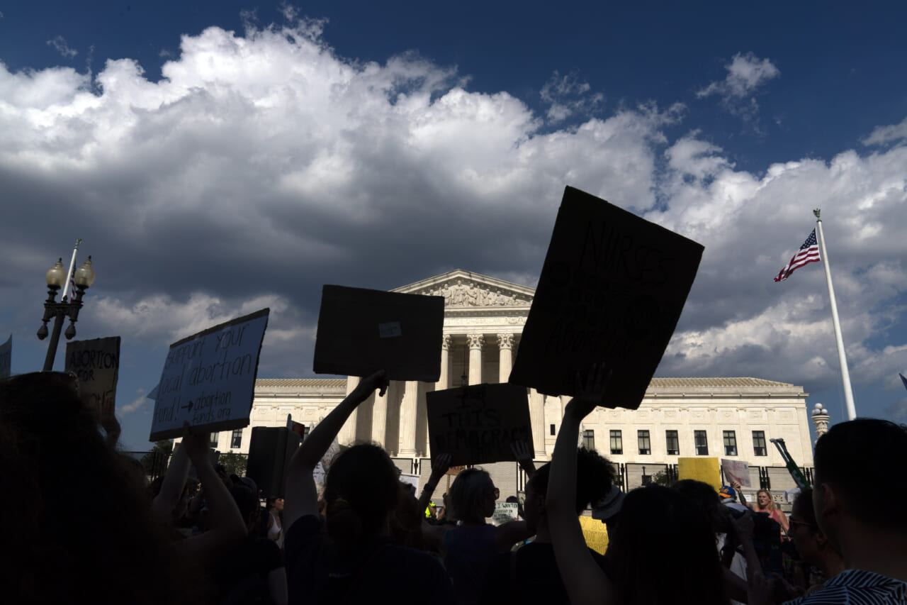 Pro choice protestors, theGrio.com