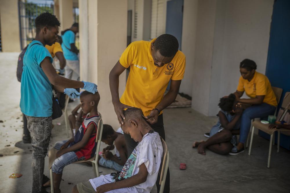 , 315 kids, adults shelter at school to escape Haiti gang war