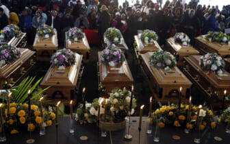 Funeral held for 19 of the 21 underage teenagers who died as they danced in a South African club