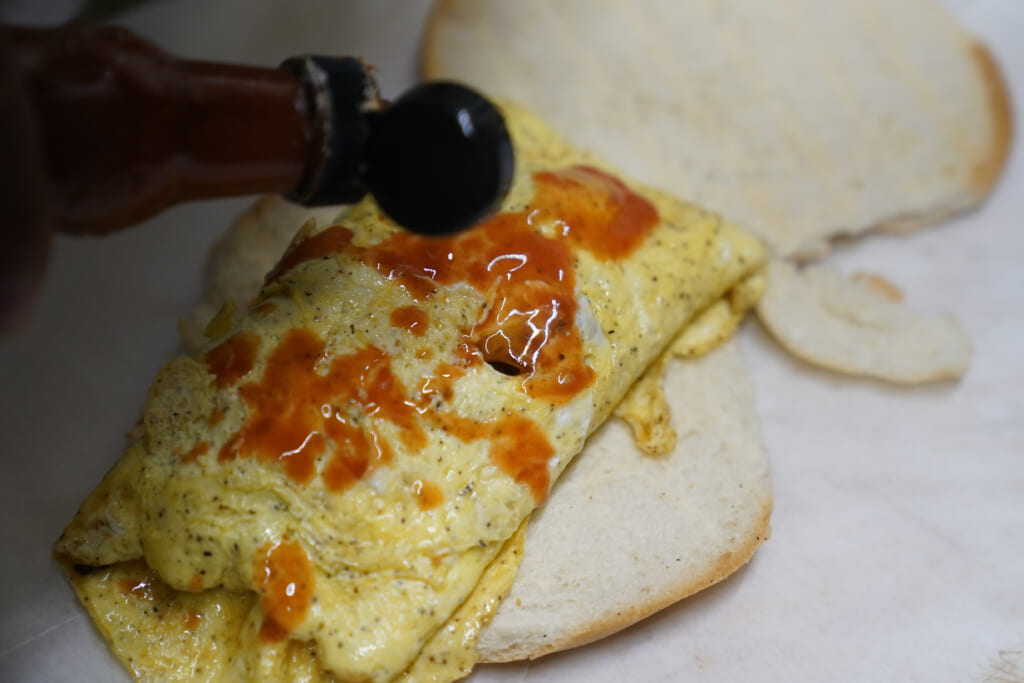 Sauce on Bacon, egg, cheese sandwich, theGrio.com
