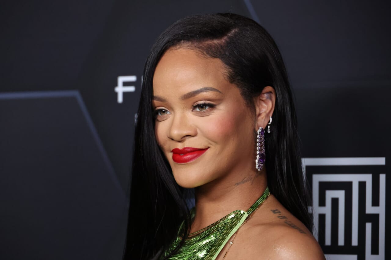Rihanna proudly shows off baby bump, and millions take note