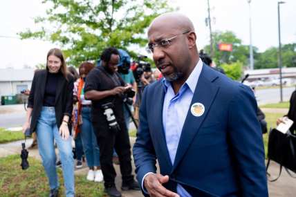 Raphael Warnock outraises Herschel Walker in highly contested race for U.S. Senate