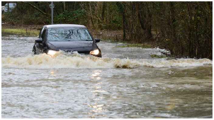 St. Louis police honor men who saved woman trapped in her car during flooding