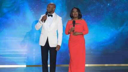 Taye Diggs and Sheryl Underwood on stage at theGrio Awards