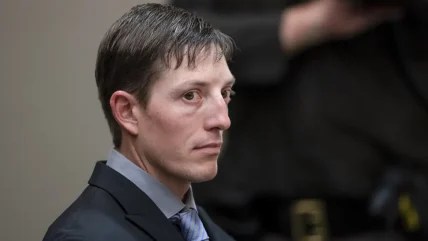 Michigan judge denies ex-officer’s bid to drop murder charge
