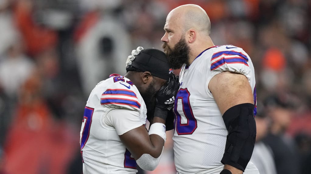 Tre'Davious White and Mitch Morse of the Buffalo Bills react to teammate Damar Hamlin's collapse