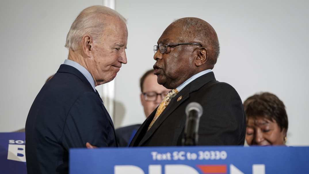 President Joe Biden shakes hands with Democratic Representative and House Majority Whip James Clyburn of South Carolina