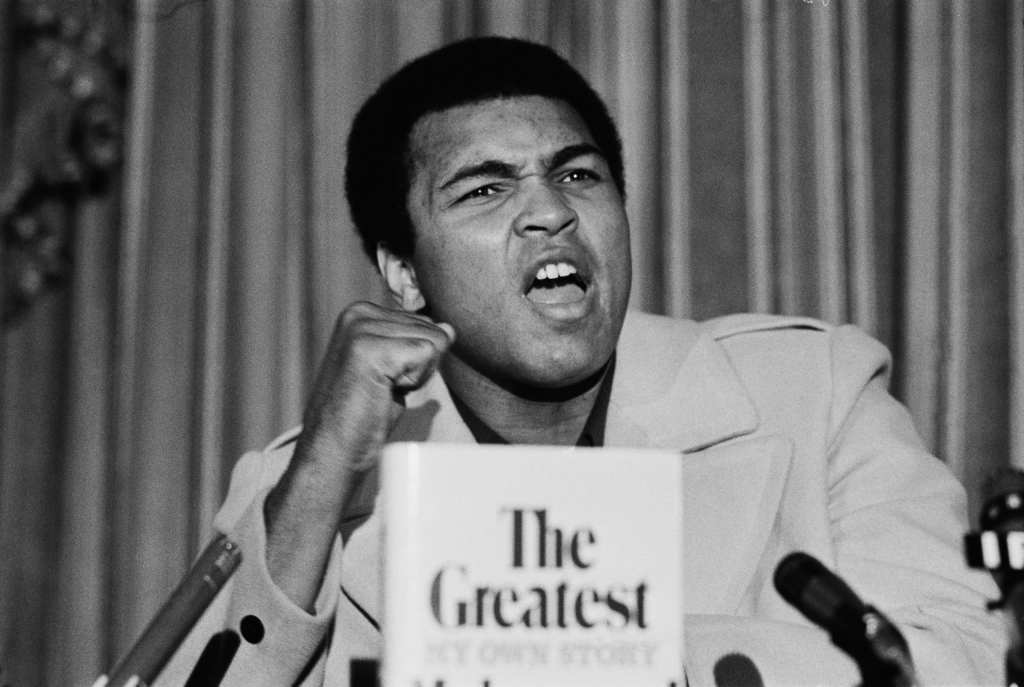 Muhammad Ali presents his new book, thegrio.com, famous black athletes