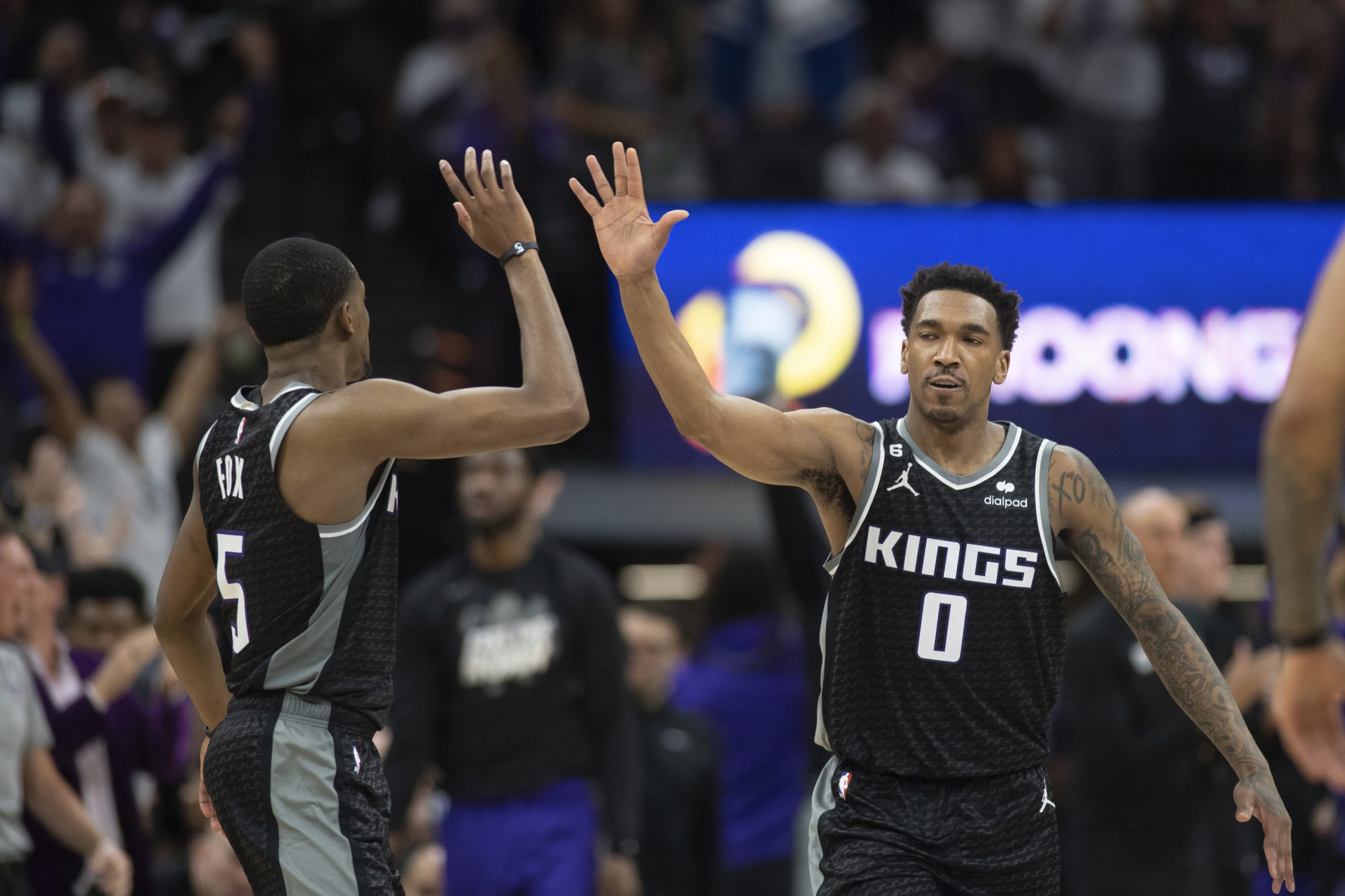 Fox leads Kings past Warriors 126-123 in playoff return