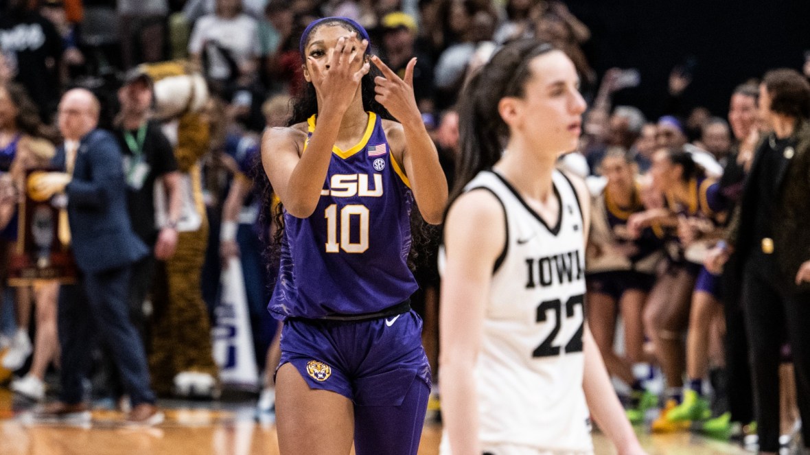 Basketball players Angel Reese of the LSU Lady Tigers and Caitlin Clark of the Iowa Hawkeyes