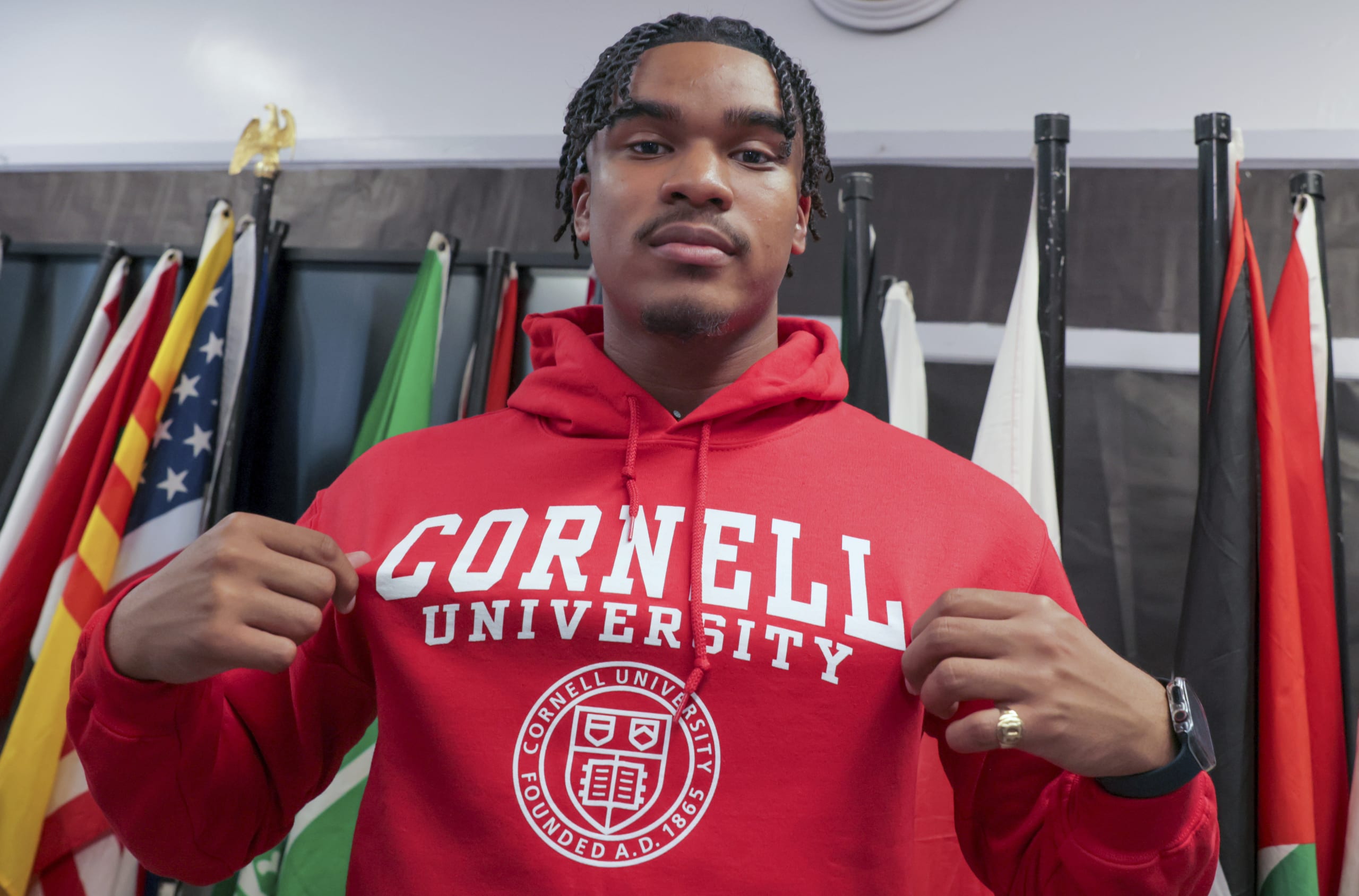 Dennis Barnes, a 16-year-old senior, picks Cornell University