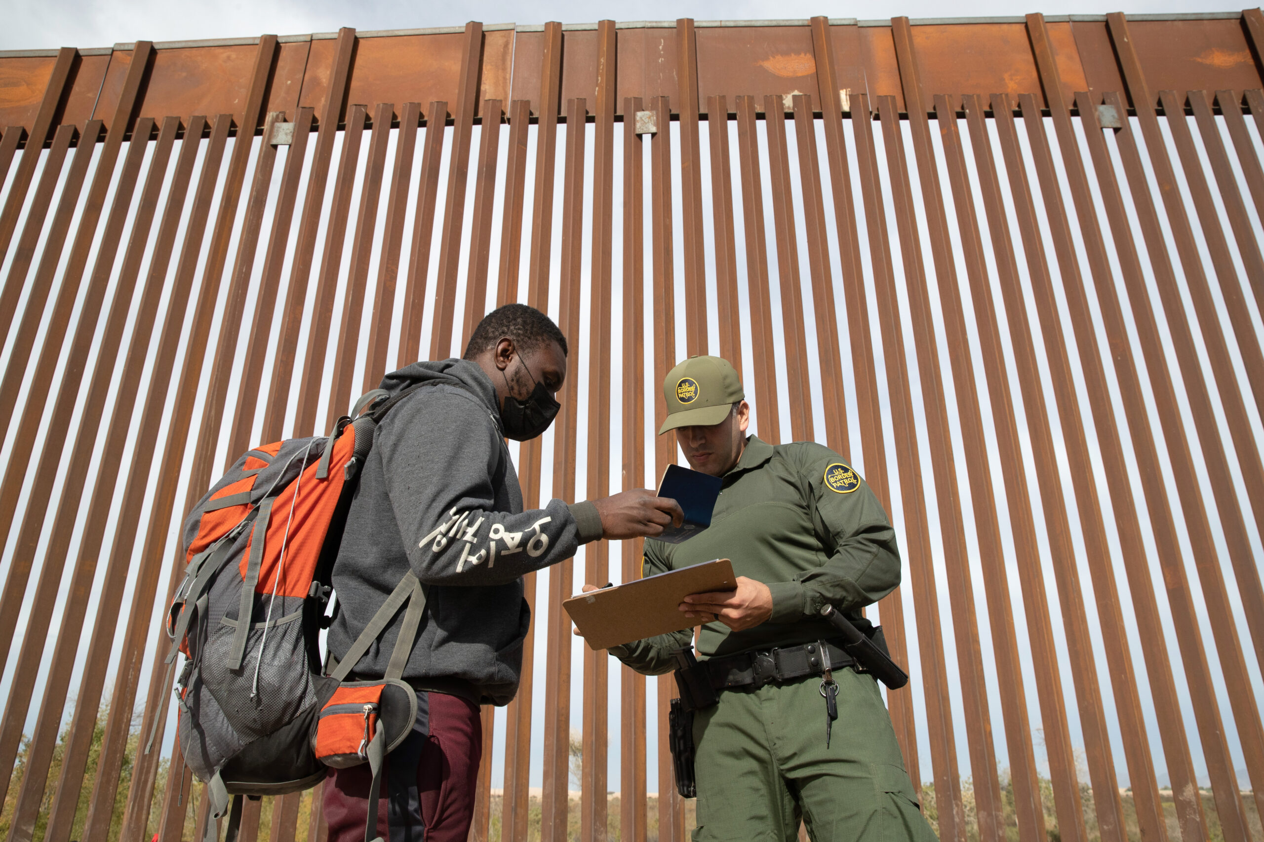 Haitian migrant, theGrio.com