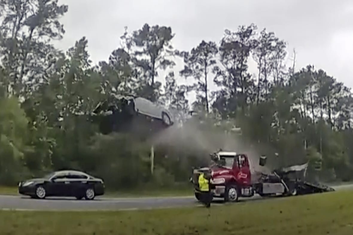 Video Car goes airborne over tow truck driver Tanaijsha Bruton