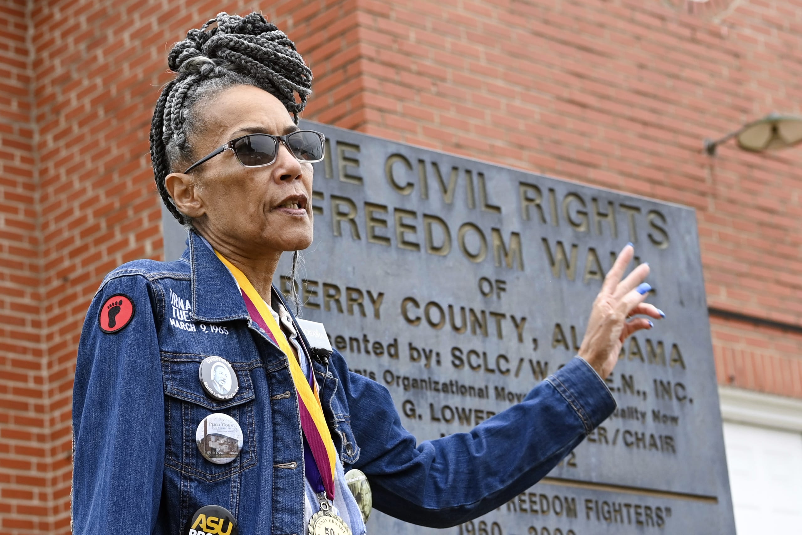 Voting rights marcher recalls police officer swinging club at her head when she was only 14