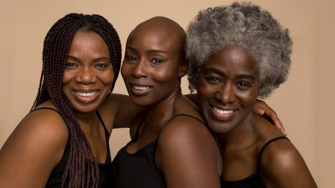 Three smiling women