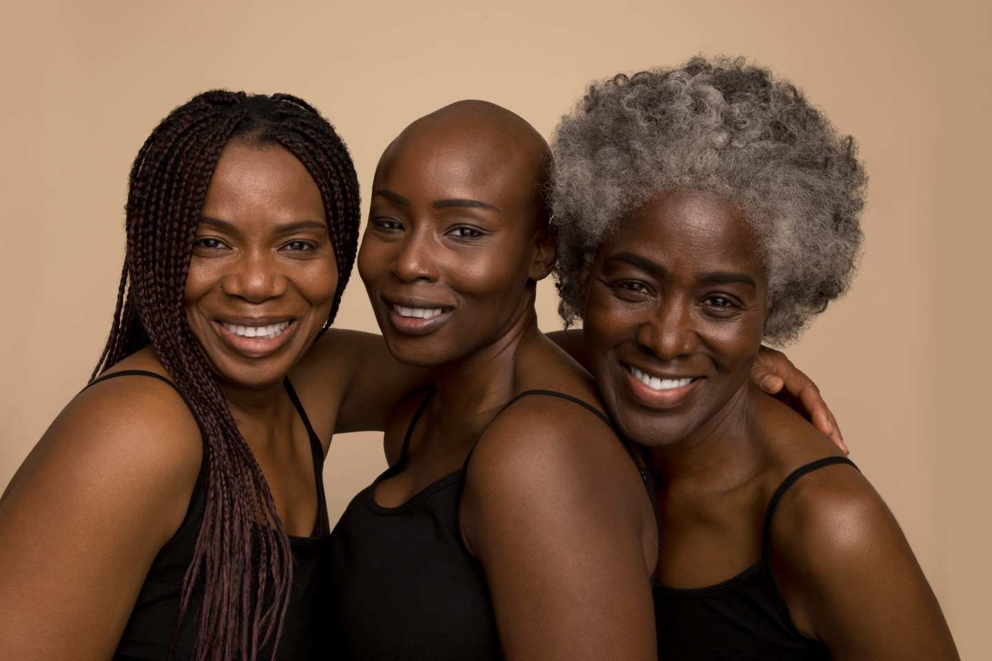 Three smiling women