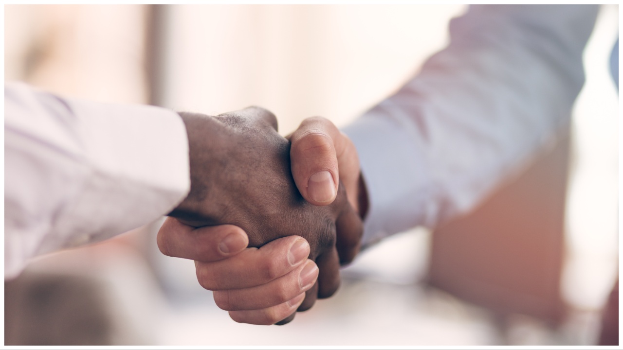 handshake between two males