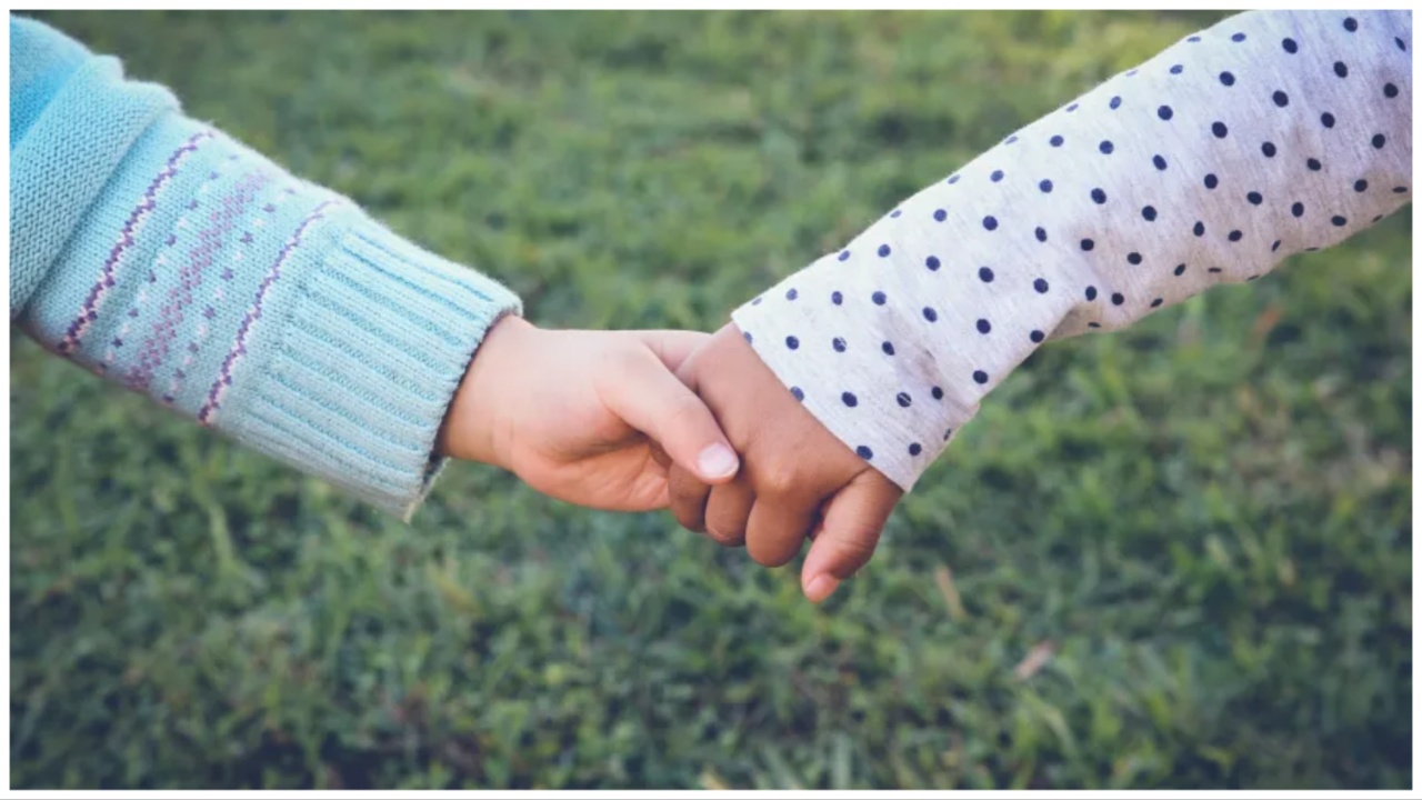 Posters of Black and white children holding hands? A Texas school trustee wants to halt such displays