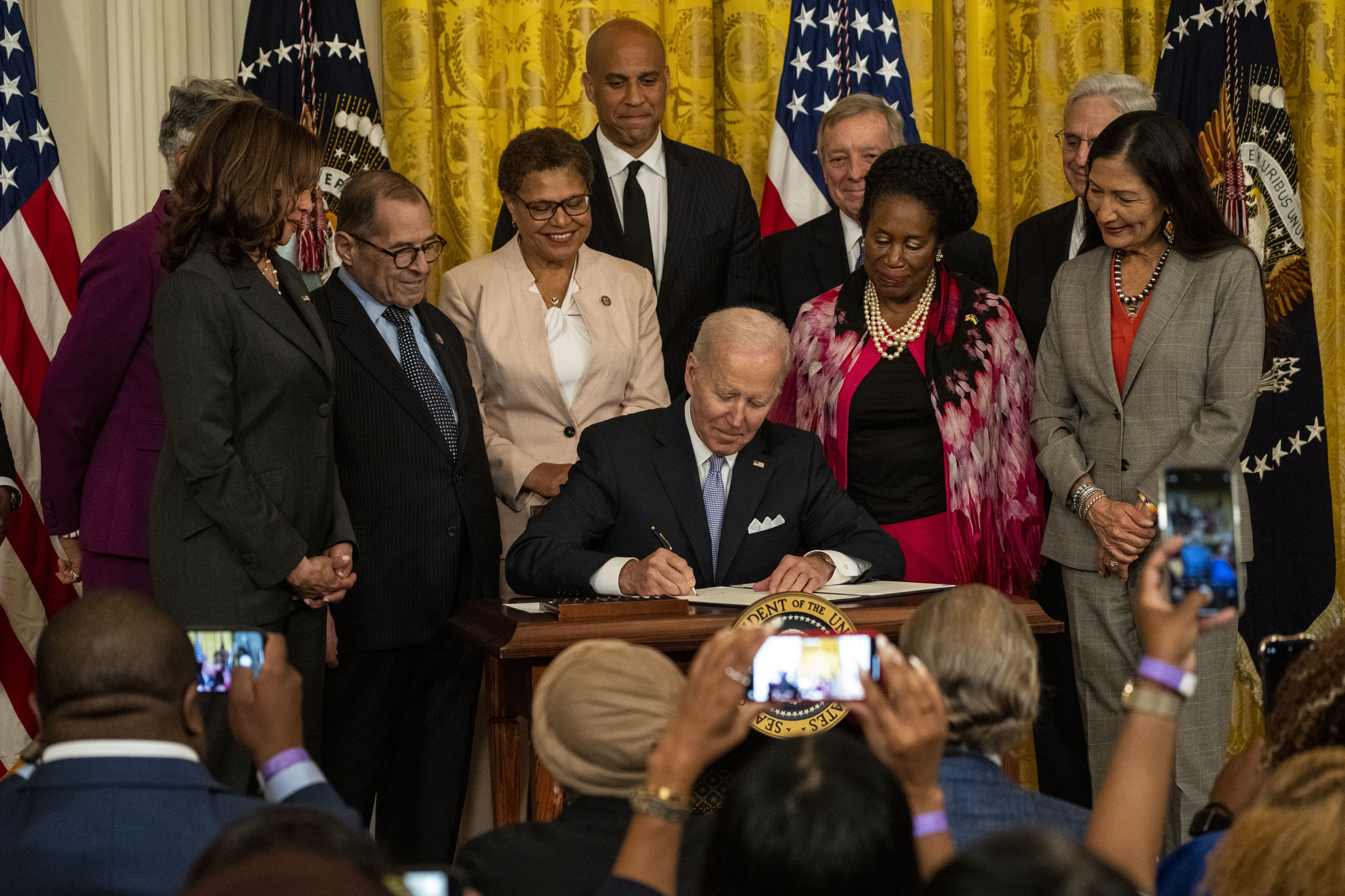 President Joe Biden signs an executive order