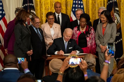 President Joe Biden signs an executive order