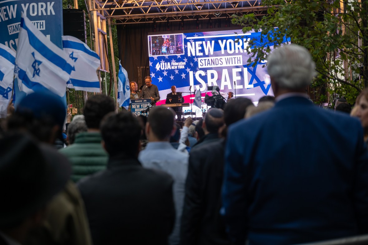 A crowd of people at a 'New York Stands With Israel' vigil and rally