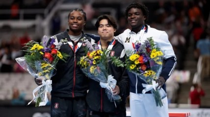Who are the two Black male gymnasts making moves?