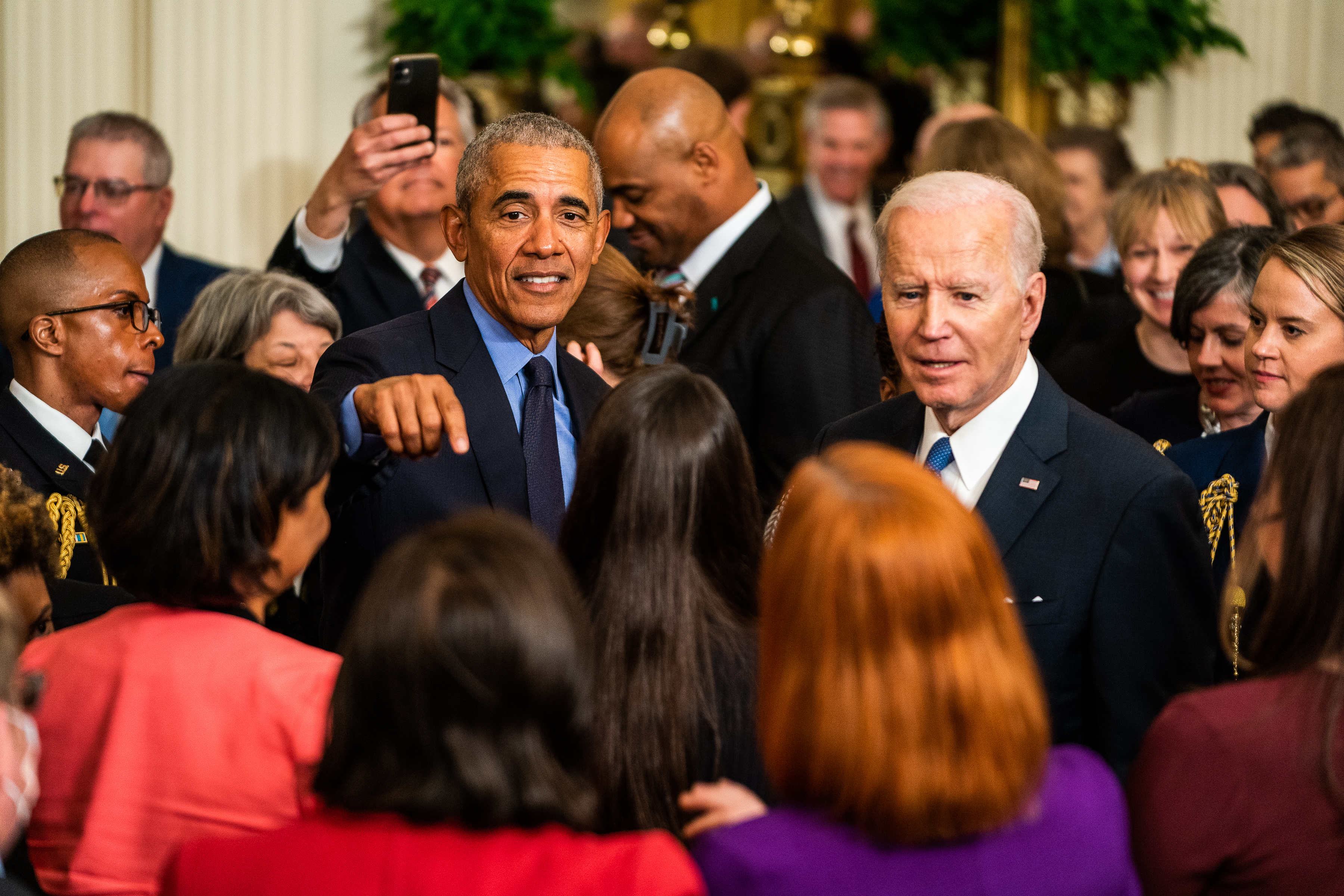 President Joe Biden and former President Barack Obama greet visitors