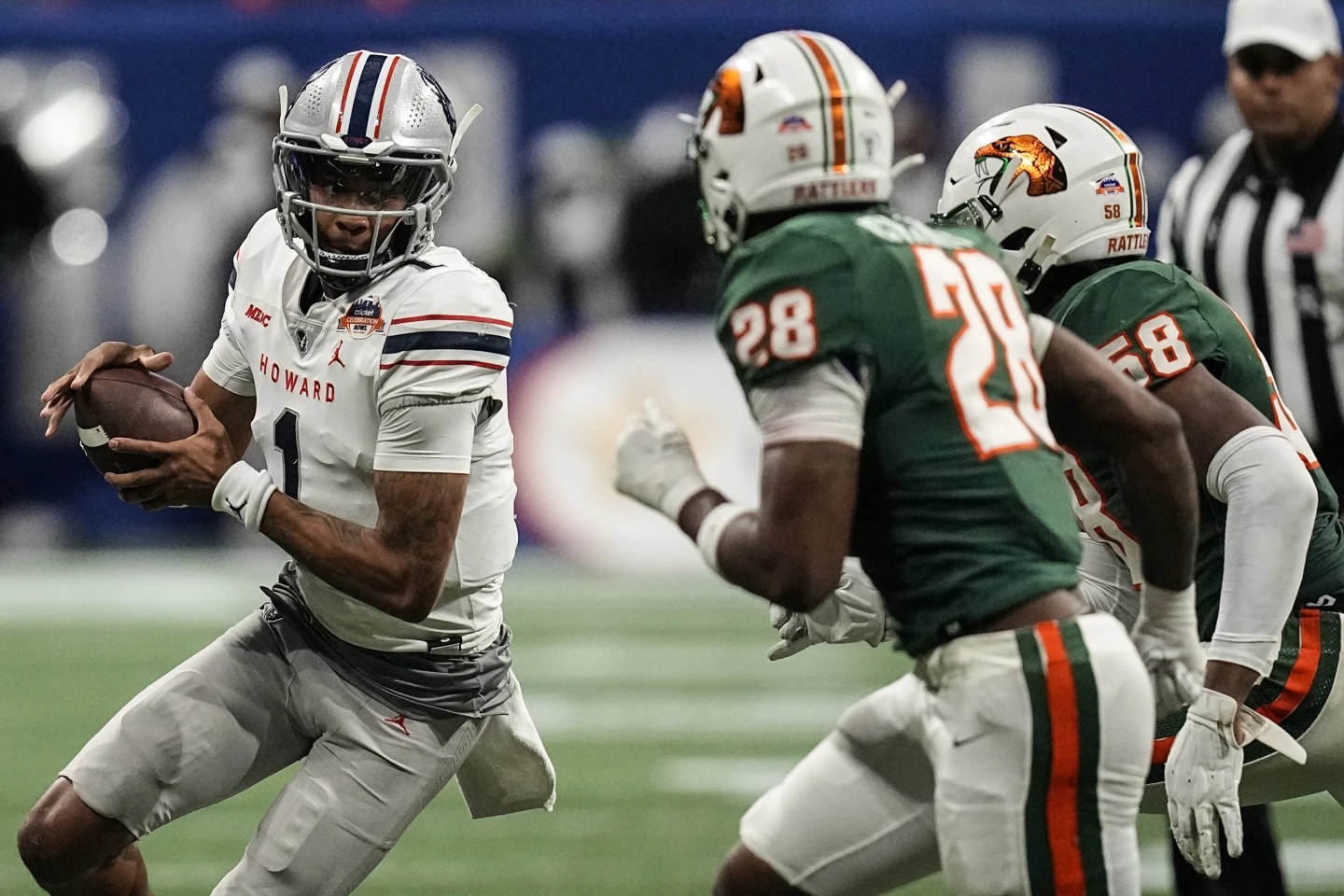 Howard quarterback Quinton Williams runs out of the pocket against Florida A&M