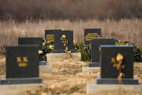 Migrants from Africa and Mideast who died in Bosnia get marble headstones and a memorial