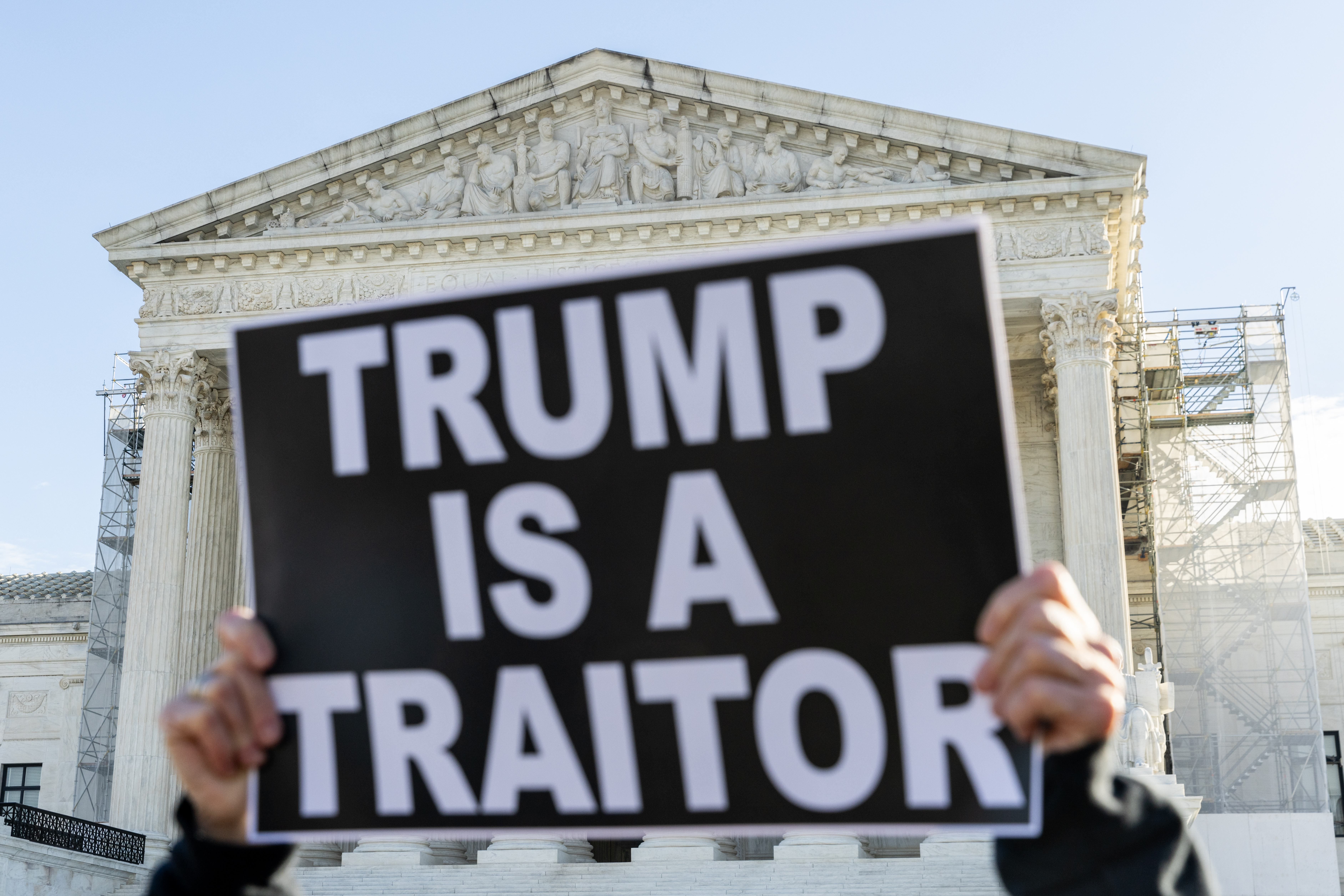 Protesters demonstrate outside of the U.S. Supreme Court