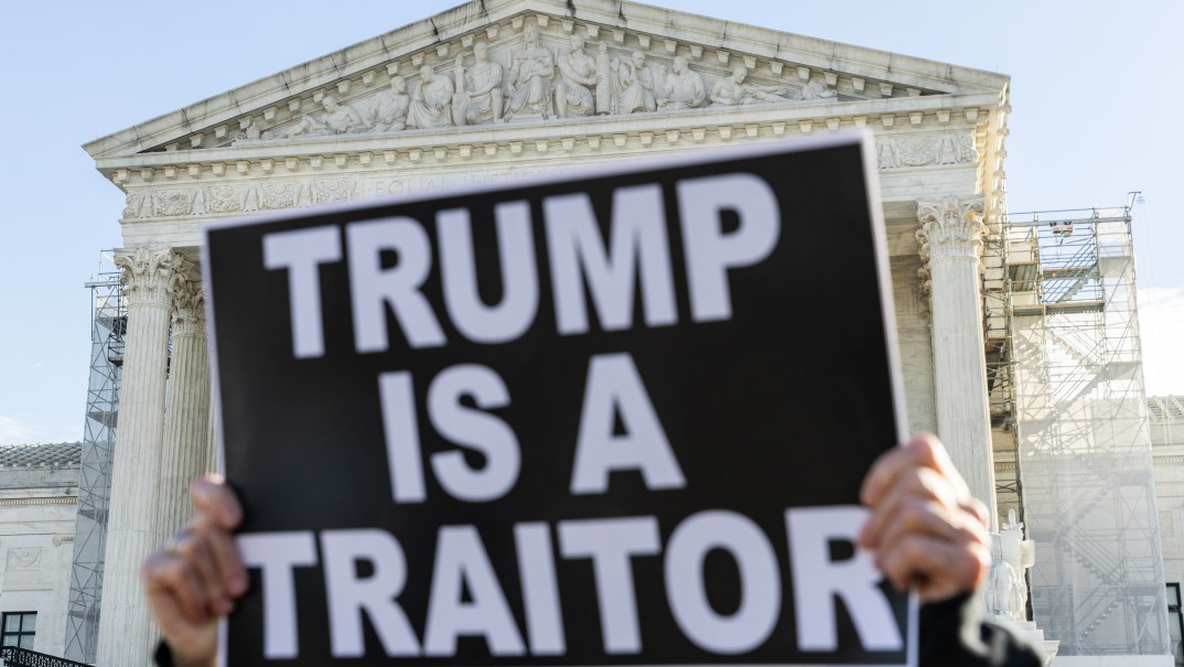 Protesters demonstrate outside of the U.S. Supreme Court