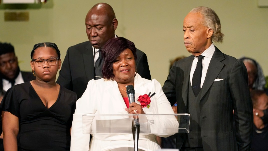 Jaselyn Thomas, civil rights attorney Ben Crump, Dexter Wade's mother Bettersten Wade and the Reverend Al Sharpton