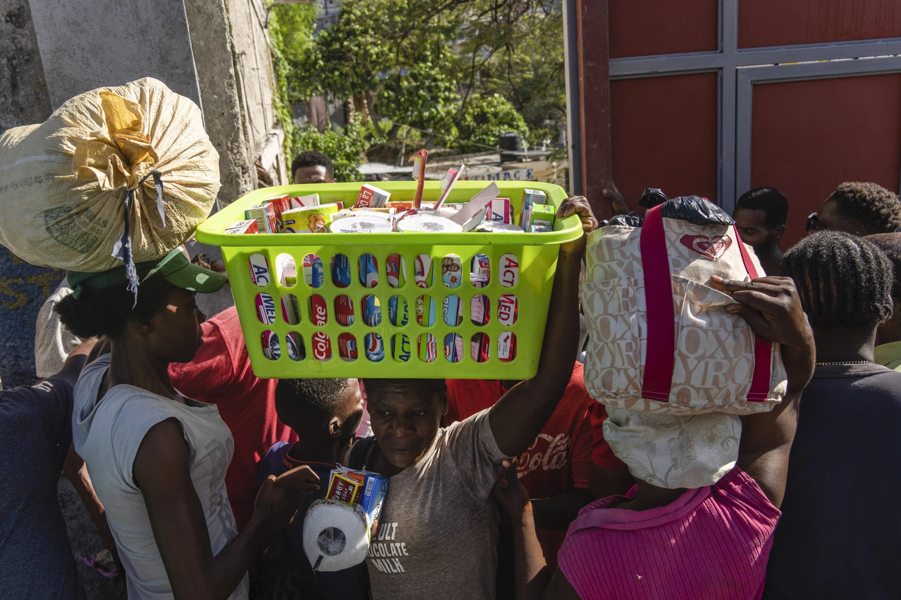 Haitians scramble to survive, seeking food, water and safety as gang violence chokes the capital