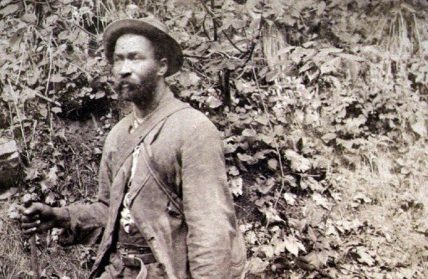Black Civil War soldier William Garvin poses outside