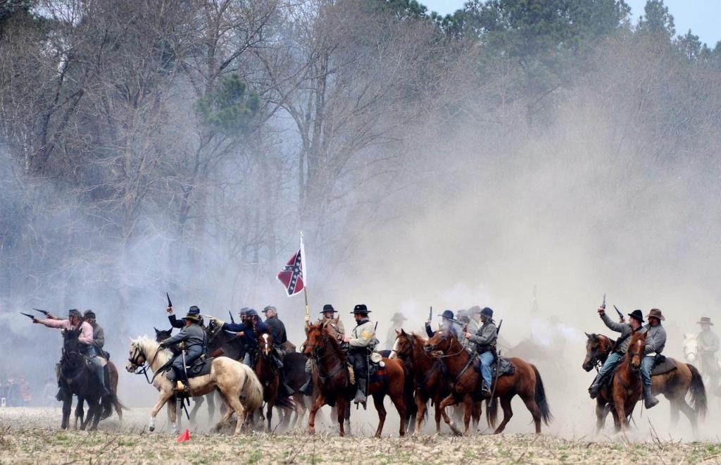 battle scene with Confederate flag, Juneteenth, thegrio.com