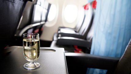 Does alcohol affect you differently on a plane?, How does altitude affect drinking alcohol?, altitude alcohol, drinking alcohol on a plane, Is it bad to drink on a flight?, travel tips, is drinking on the plane bad for you? theGrio.com