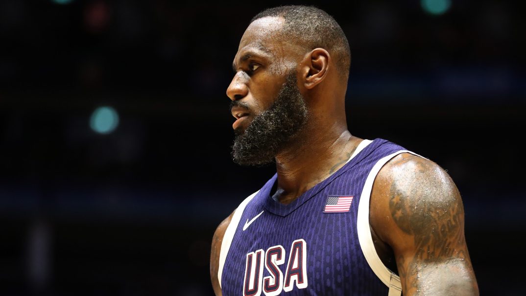 LeBron James Team USA, Lebron James Olympics, LeBron James Flagbearer USA, Is Lebron james in the 2024 Olympics, LeBron James Paris Olympics, LeBron James Olympics 2024, Who is on Team USA Basketball 2024, Team USA Basketball 2024, Who will be on the 2024 USA Basketball team?, Has LeBron James played for USA?, What NBA players are going to the Olympics in 2024?, Team USA South Sudan, theGrio.com