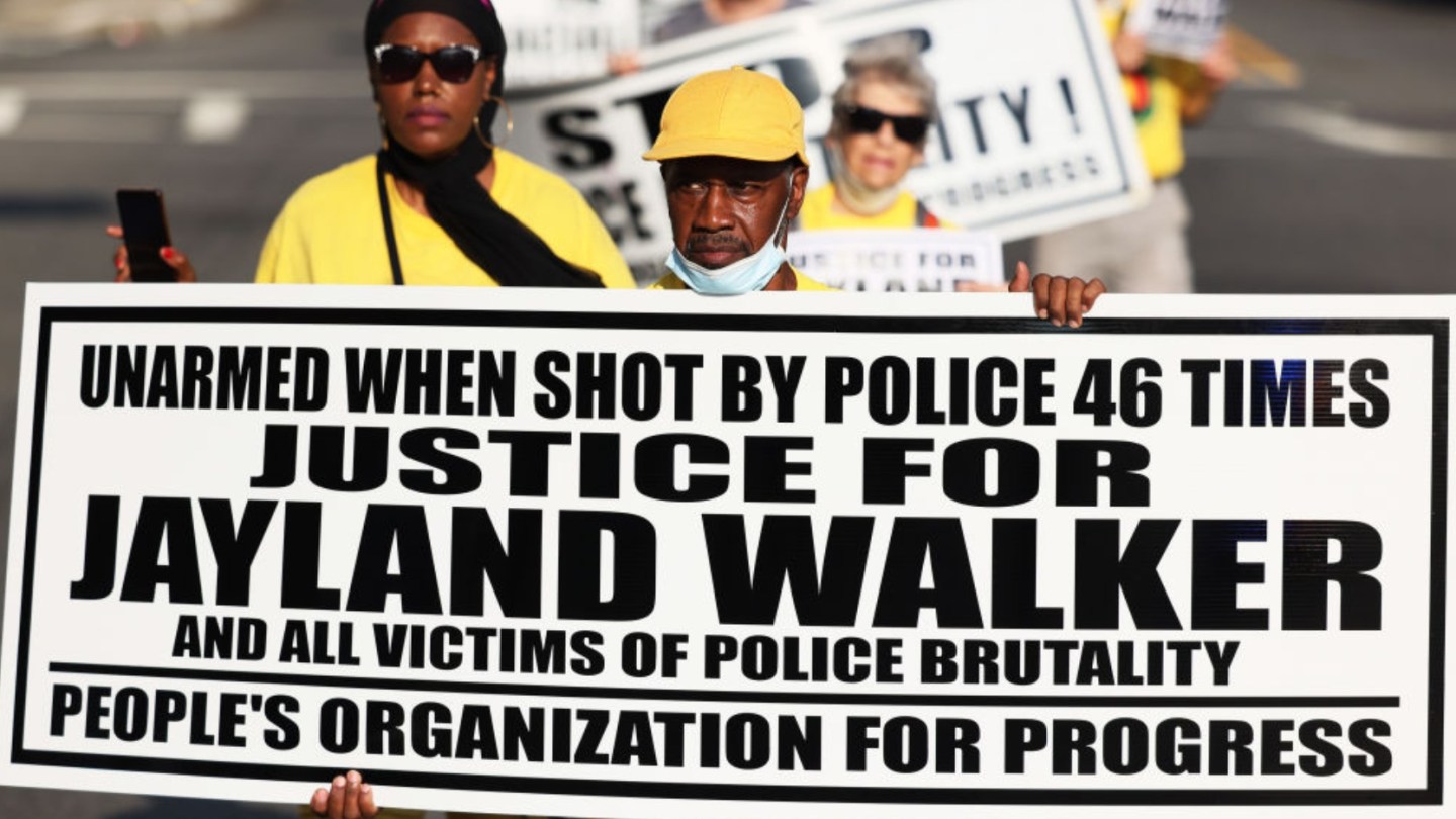 NEWARK, NEW JERSEY - JULY 15: People march demanding justice for Jayland Walker on Market Street on July 15, 2022 in Newark, New Jersey. The People’s Organization for Progress (POP) organized a march and rally to demand justice for Jayland Walker, who was killed in Akron, Ohio by police on June 27, 2022. According to a medical examiner's report released today Walker, who was unarmed at the time, suffered 46 gunshot wounds after multiple police officers shot at him an estimated 90 times following a car chase. The family held an open casket funeral for Walker on July 13th, and drew comparisons to a choice by Emmett Till’s mother 67 years ago that helped galvanize the national Civil Rights Movement. (Photo by Michael M. Santiago/Getty Images)