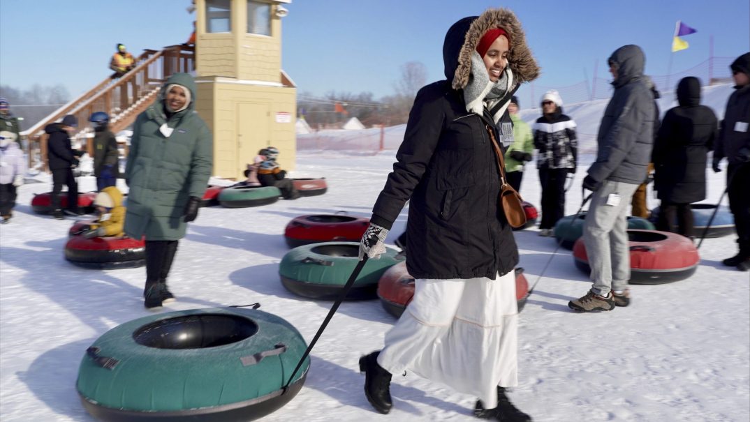 Snow Tubing in Hijabs, hijabs, Muslims in Minnesota, hijabs in America, theGrio.com