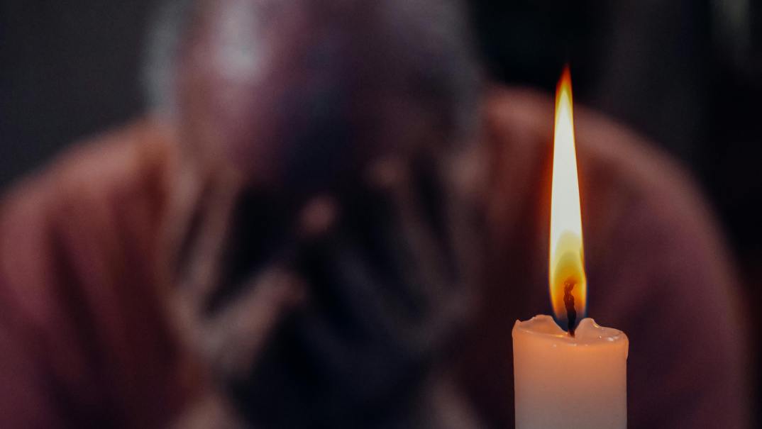 Dementia, Candle with man in background, Pexels, Photo by Kindel Media, thegrio.com