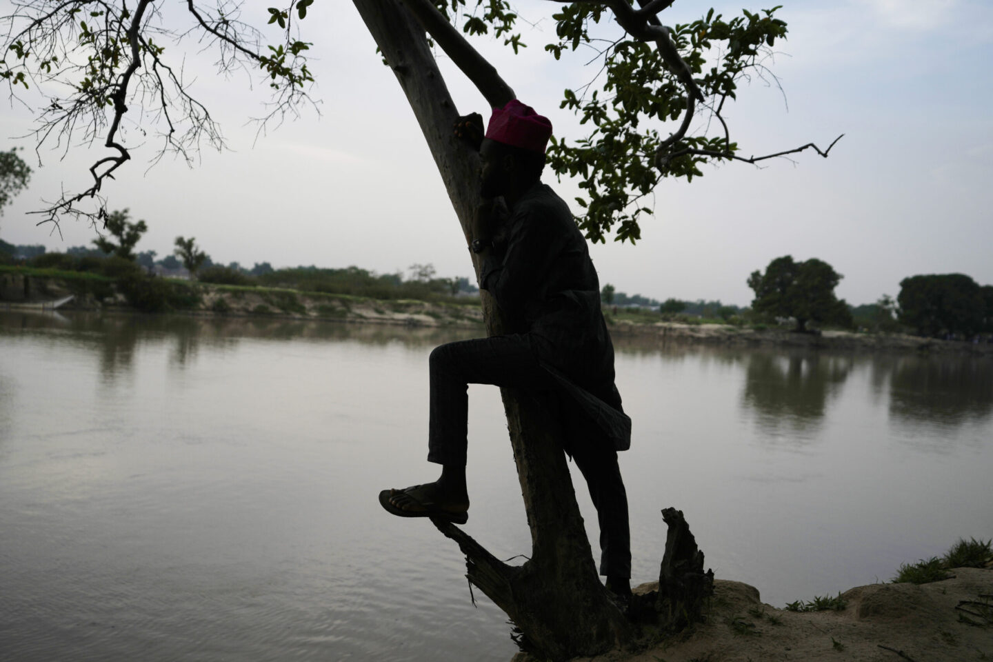 Man stands on the banks of the Yobe river in Nigeria