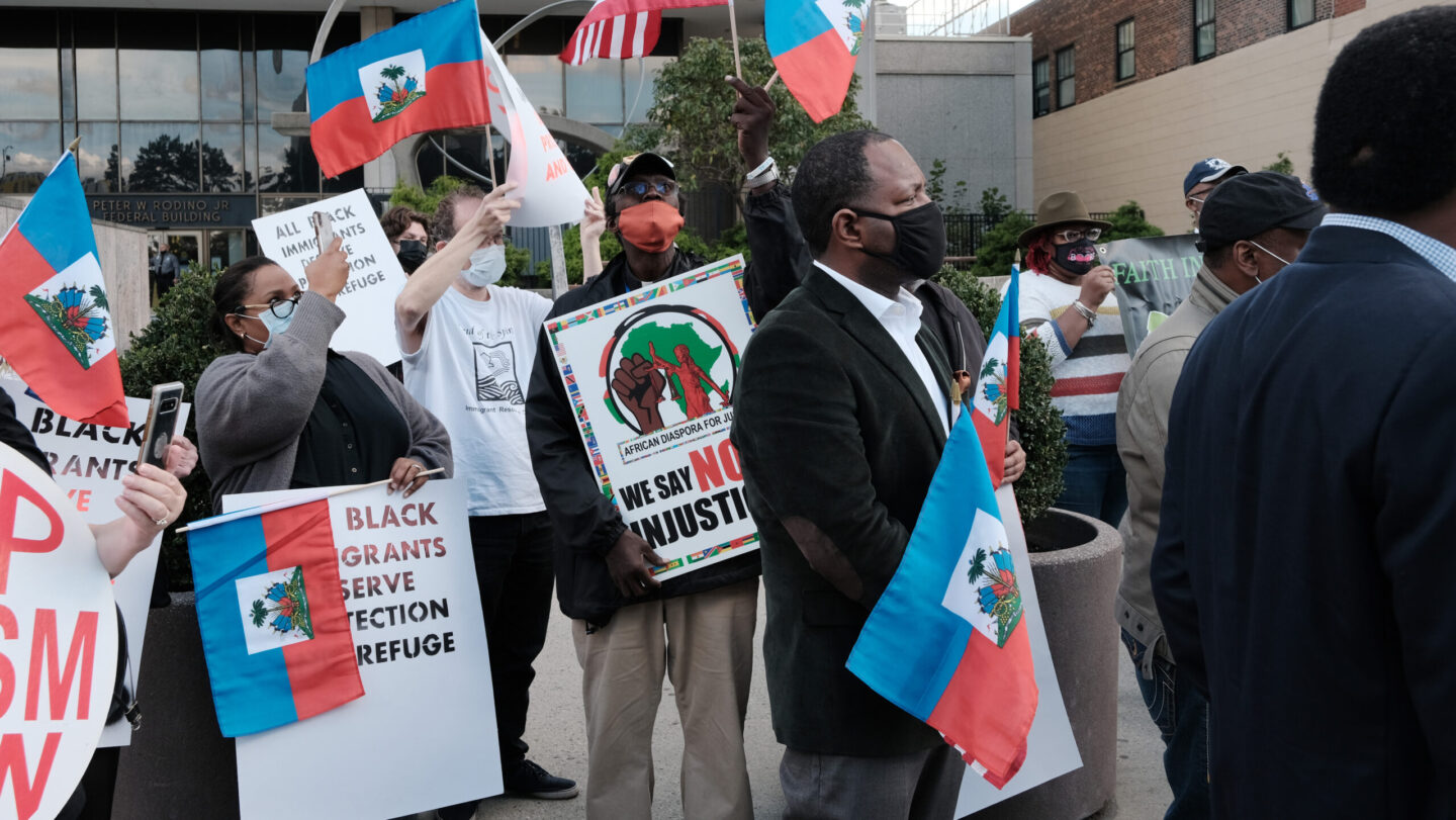 Haitian Community Protests Outside ICE Office Demanding End To Deportations Haitian man dies in ICE custody, Haitian man Arizona ICE, ICE arizona theGrio.com
