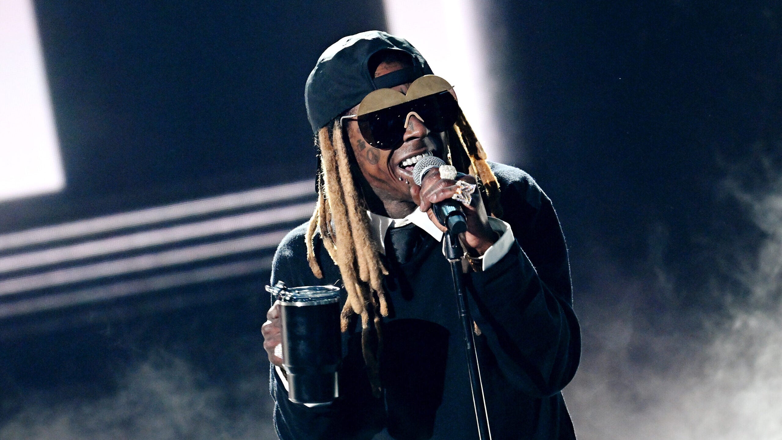 Lil Wayne shuts down engagement rumors and reveals why he missed tour opener